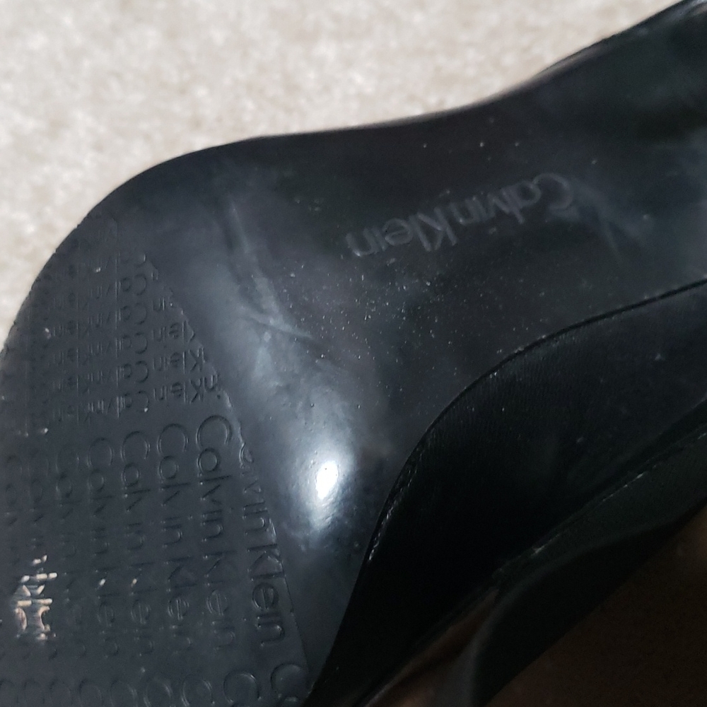 Black Calvin Klein pumps